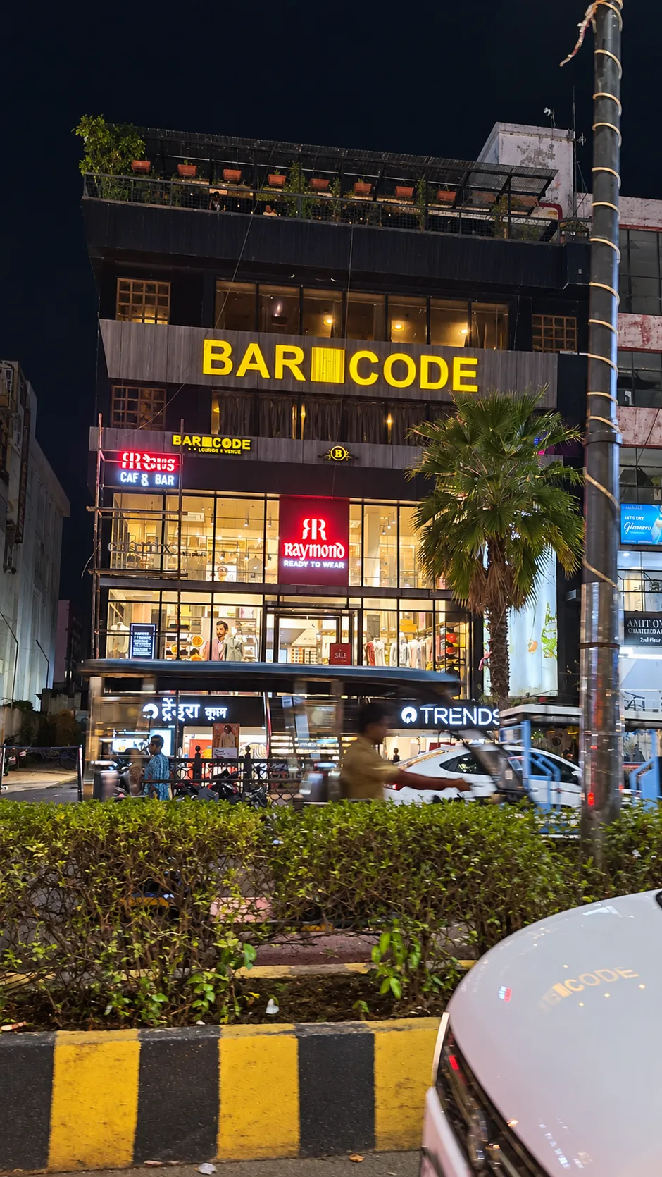 The BAR CODE bar, restaurant and party venue in Civil Lines, Prayagraj, at night.