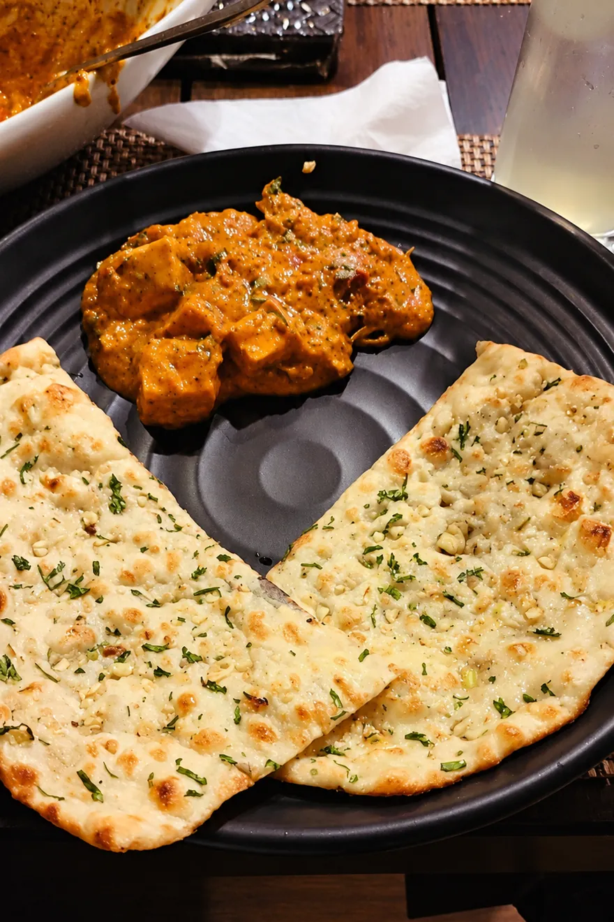 Paneer curry with herbed naan at BAR CODE restaurant in Civil Lines, Prayagraj.